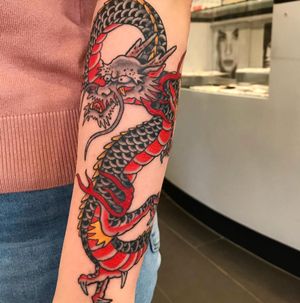 Get a stunning Japanese dragon tattoo on your forearm in London, GB. Let this powerful symbol of strength and wisdom showcase your style.