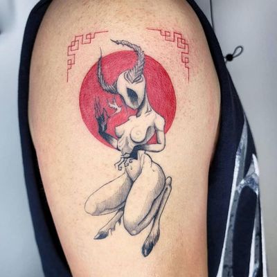 Express your inner strength with this stunning illustrative watercolor tattoo of a woman with horns. Perfect for your upper arm in Los Angeles.