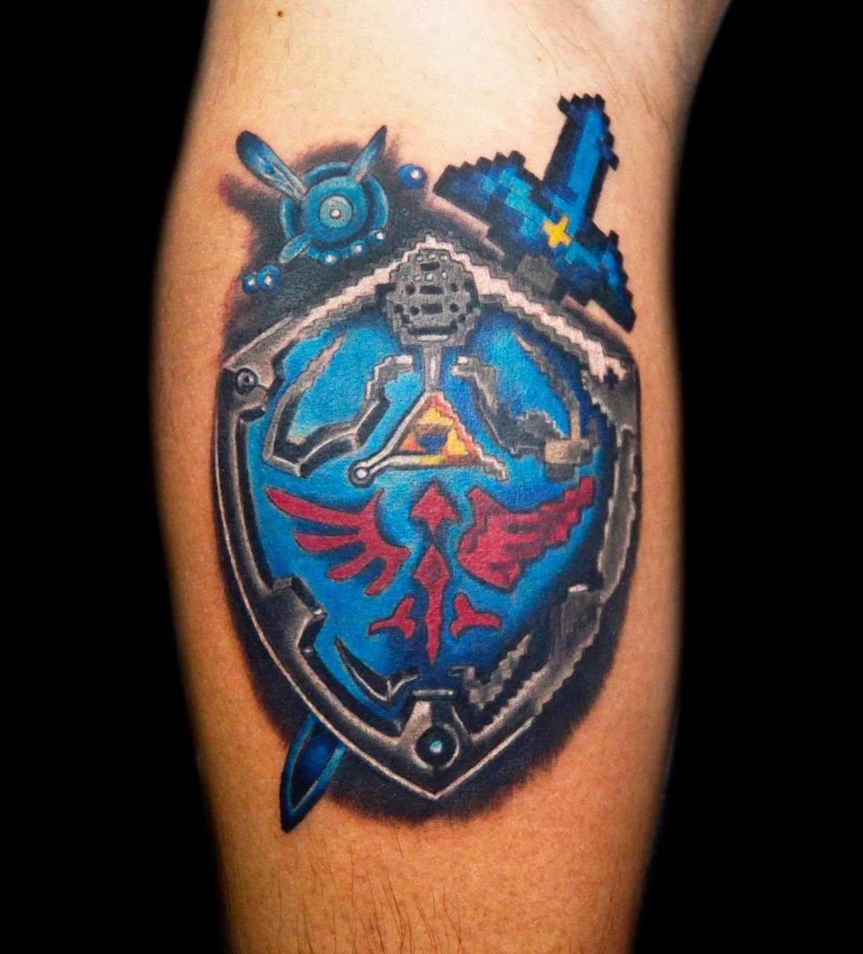 Jason Tattoo Artist on Instagram Legendary Hylian Shield legendofzelda  colortattoo linework hylianshield legendofzeldatattoo videogametattoos  moontattoo atx
