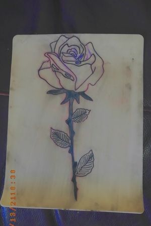 Single rose tattooed last week