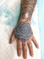 Cover Up tattoo using rose.