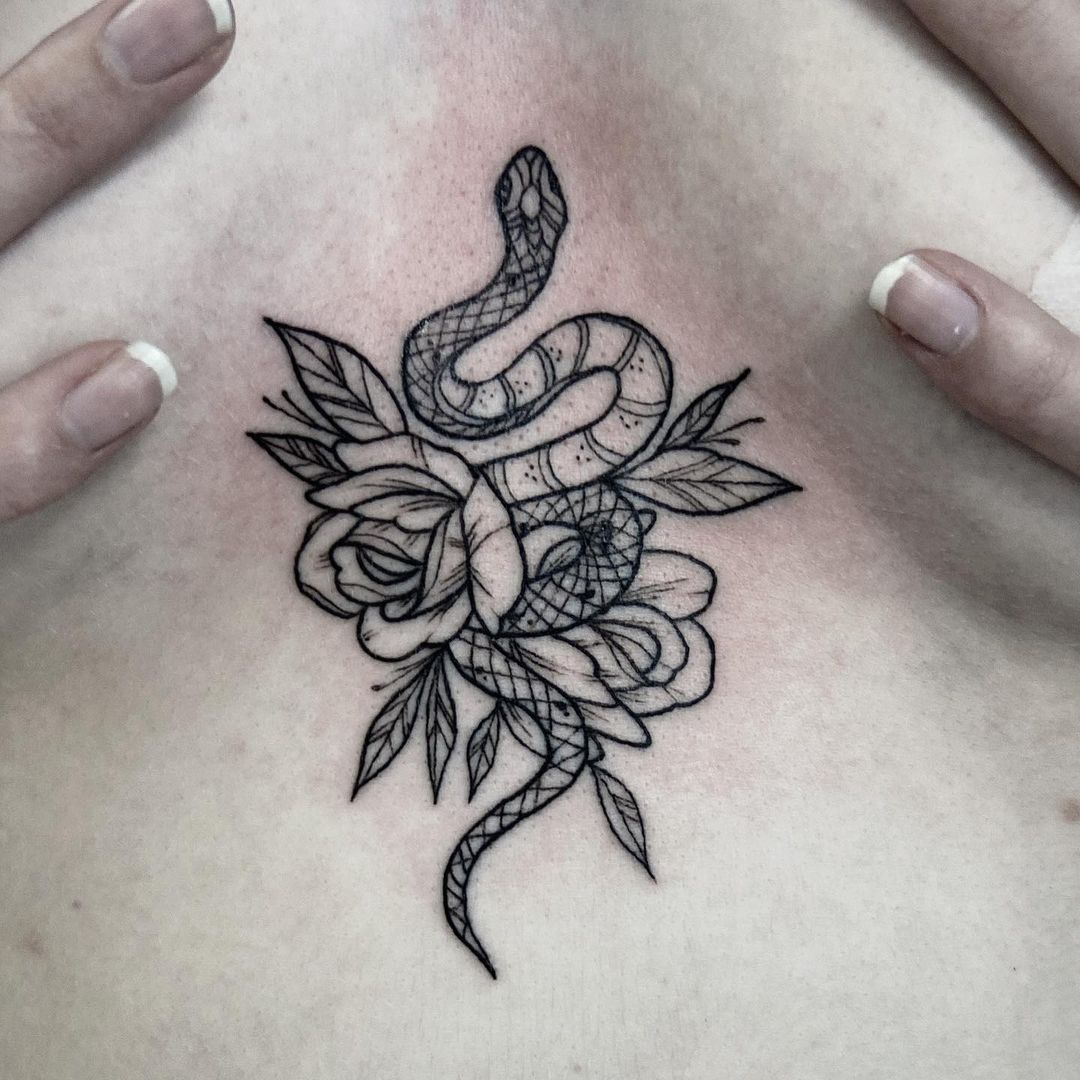 Tattooed a lil snake on my sternum  rsticknpokes