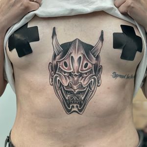 Get a stunning black and gray Japanese hannya tattoo on your stomach by the talented artist Phillip Wolves.