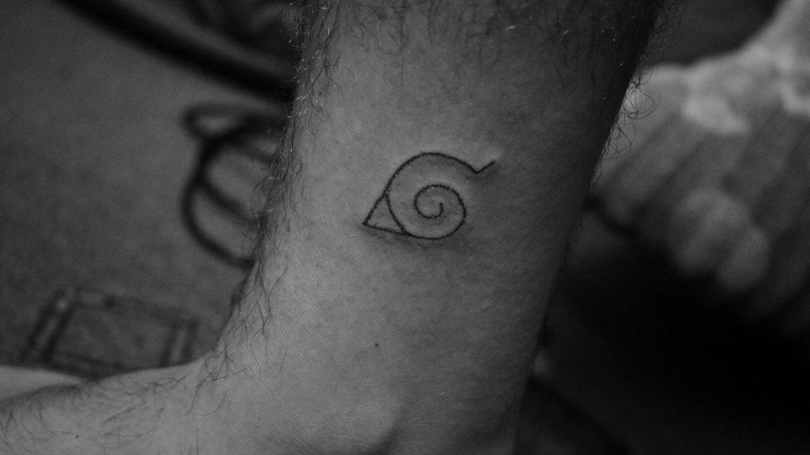 27 Minimalist Naruto Tattoos That Subtly Pay Homage