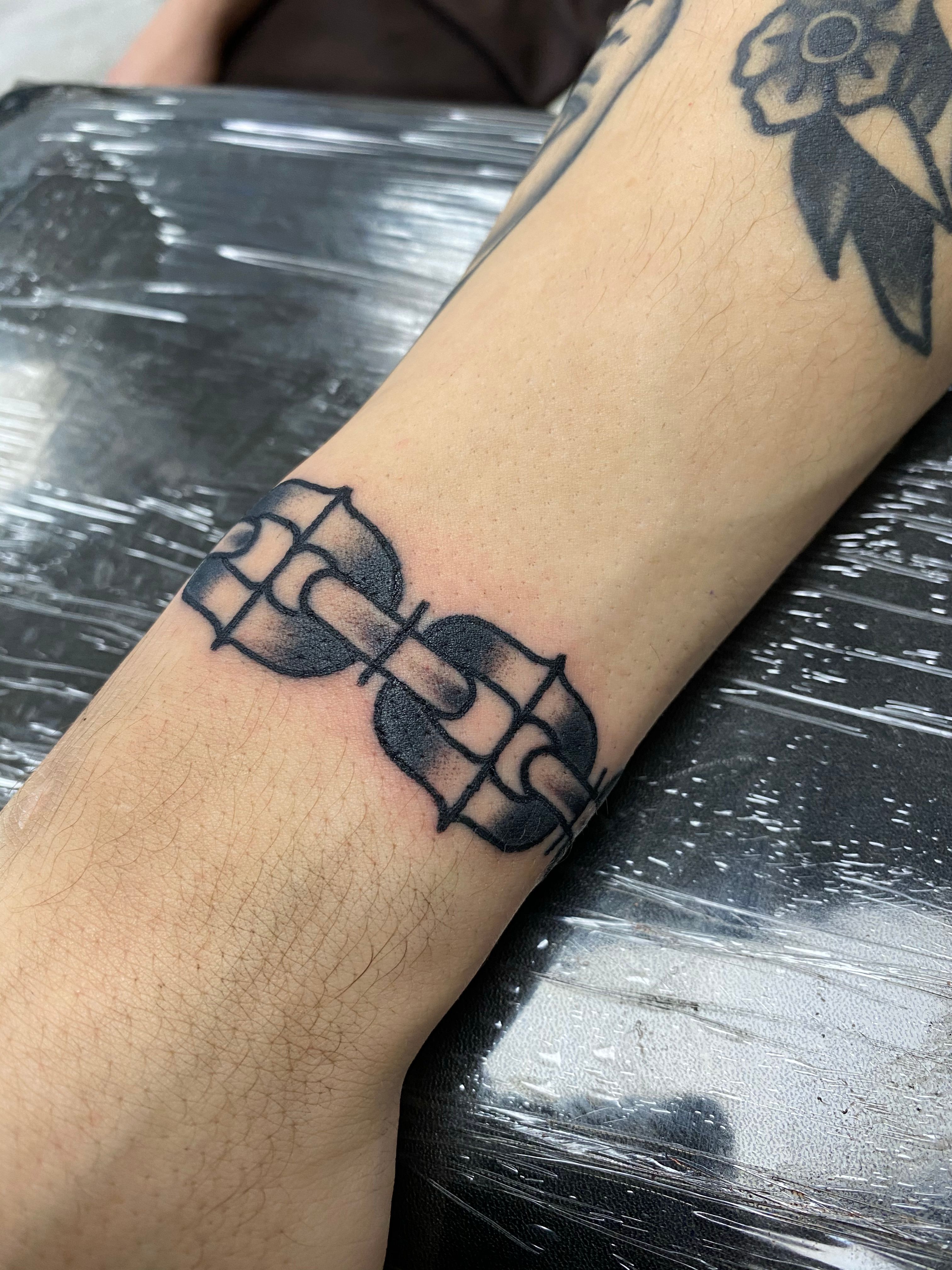 Wrist band tattoo 🐇 - Black Shade Tattoos | Facebook