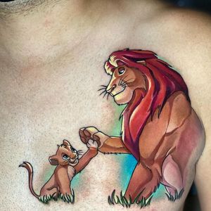 Roar with pride with this detailed lion tattoo on the chest, crafted by the skilled hands of Max Rodriguez.