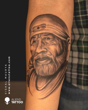 Checkout this amazing Saibaba Tattoo  by our brilliant artist Vishal Maurya at Aliens Tattoo India.If you wish to get this tattoo visit our website - www.alienstattoo.com