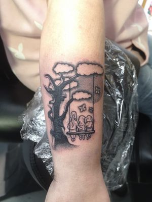 Cover up of name with tree and swing