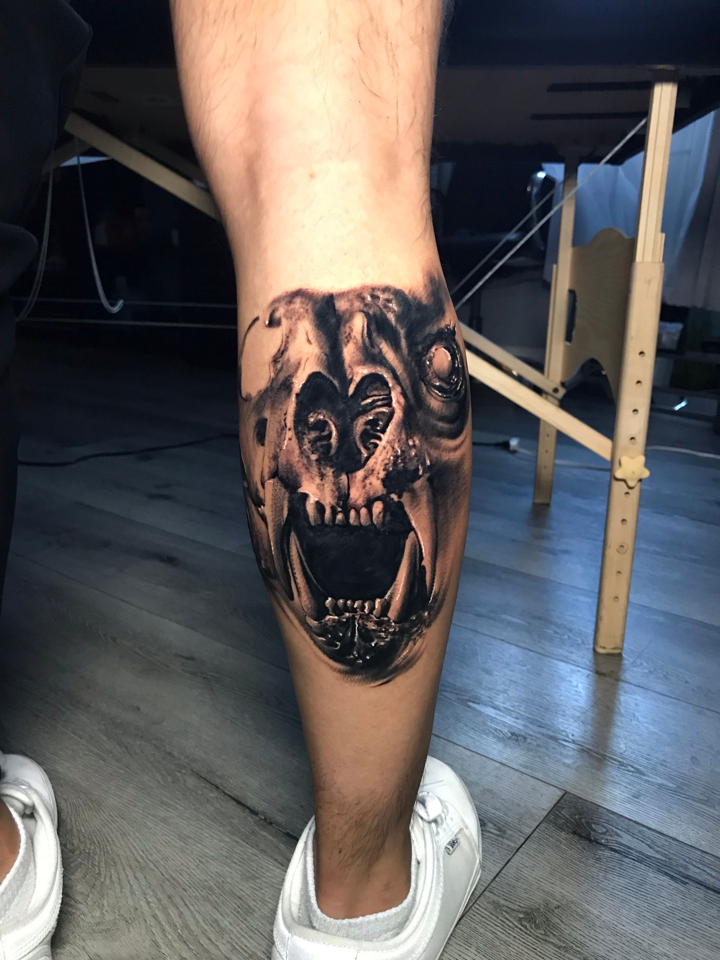 Black and Gray Animal Skull tattoo by