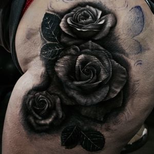Dark roses to start this thigh piece