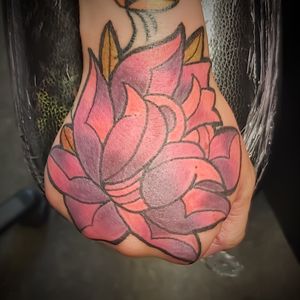 Flower hand tattoo