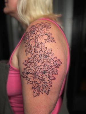 Another half sleeve started of flowers. 