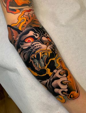 Wild cat tattoo 