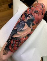 Bird and flower tattoo 