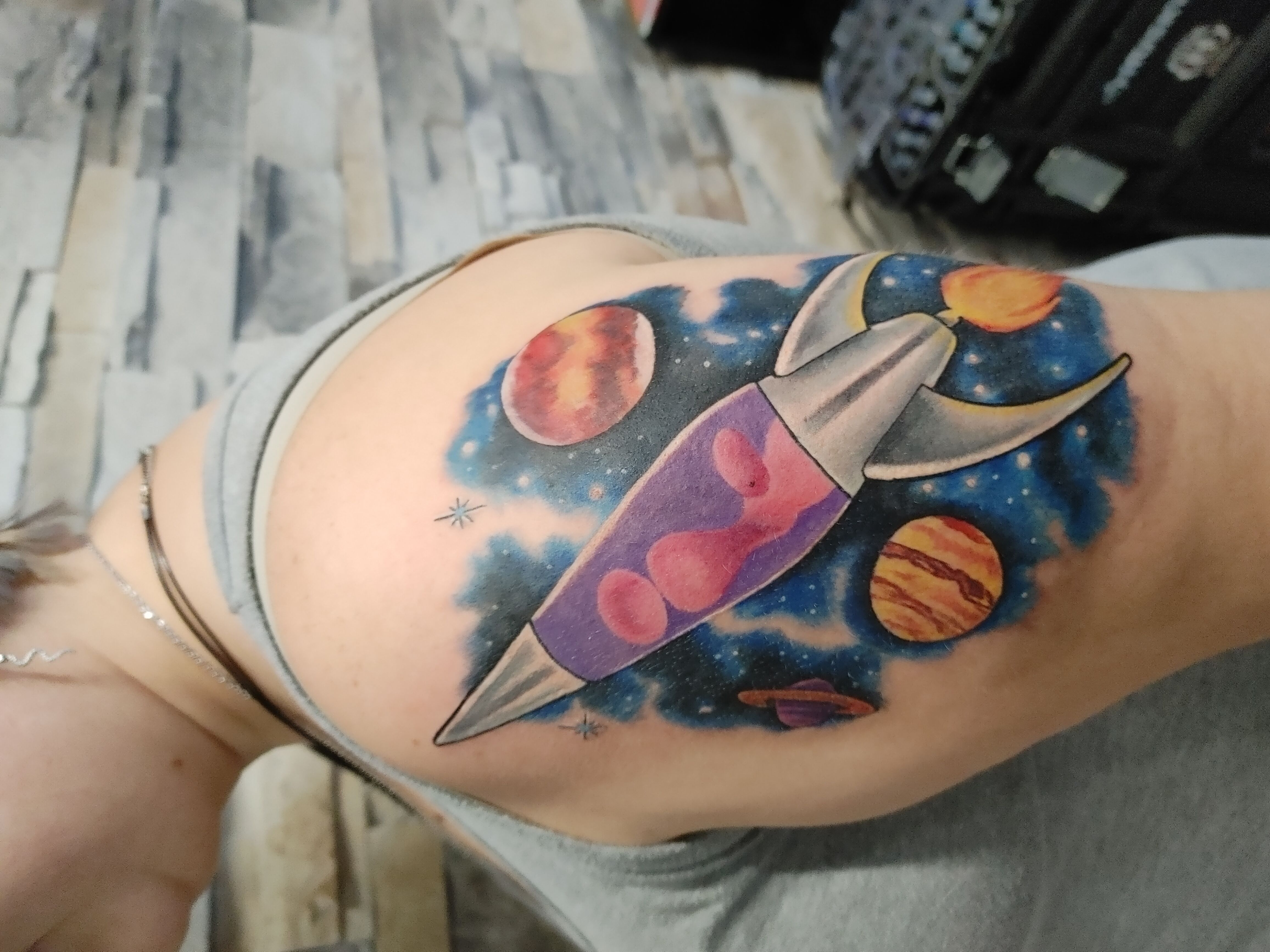 Tiny alien spaceship ankle tattoo - Tattoogrid.net