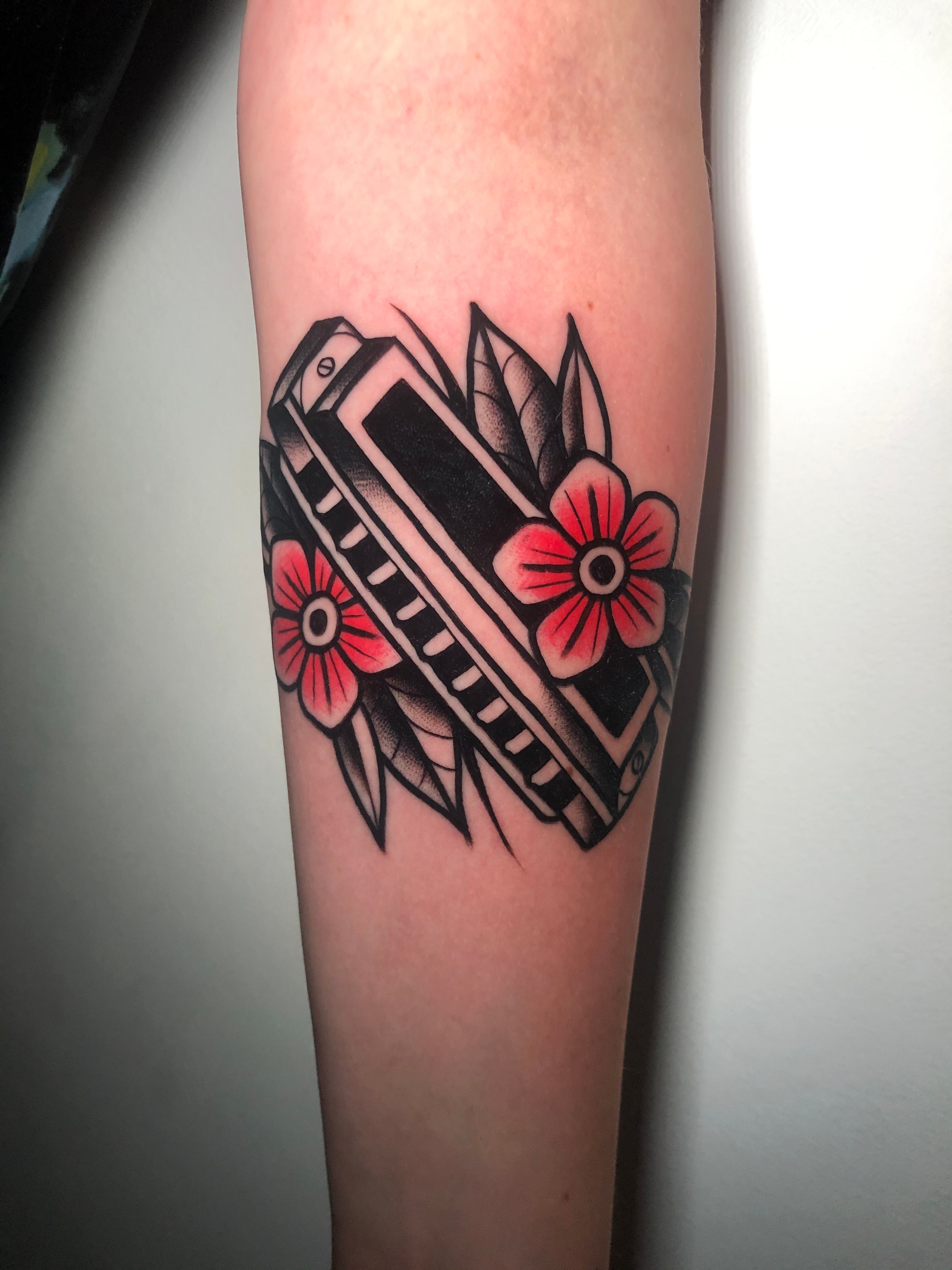 Worthey Tattoo - Added some color to the harmonica tattoo... | Facebook