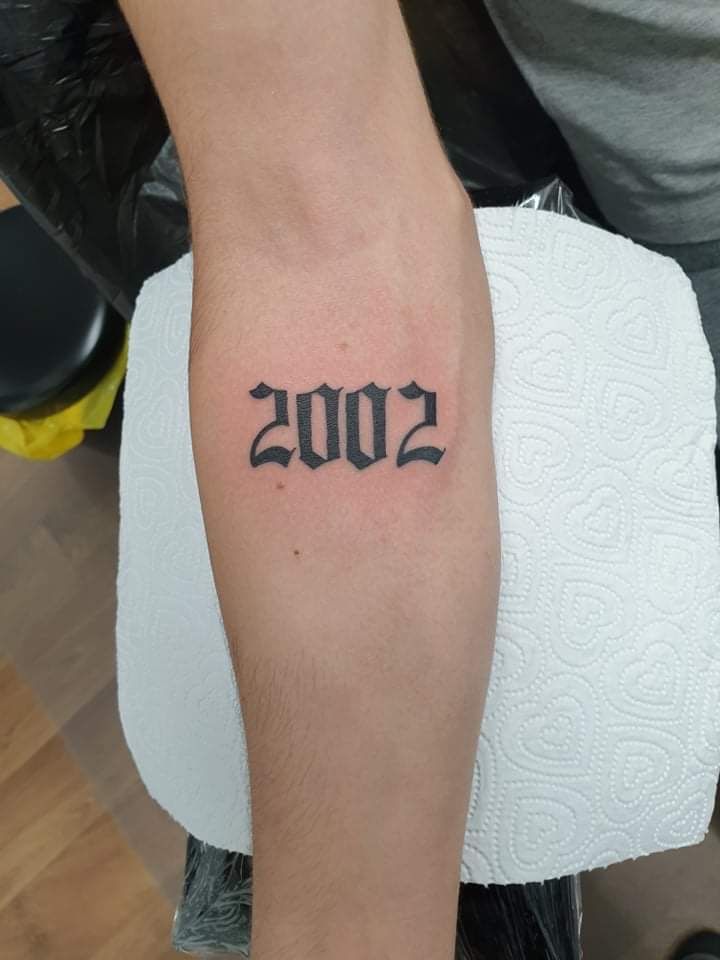 Details 63+ 2002 old english tattoo latest - in.cdgdbentre