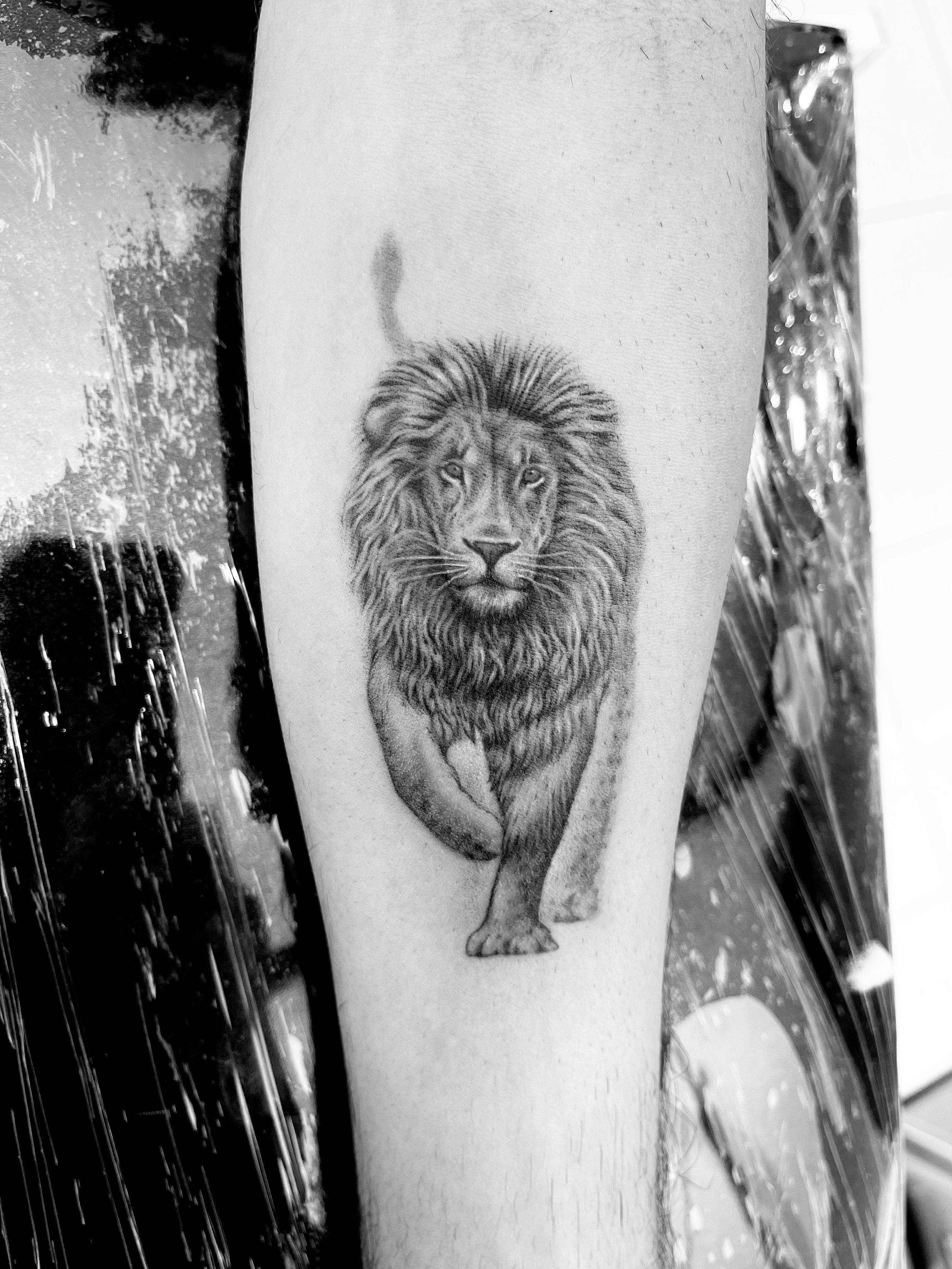 Lion and Butterfly Thigh Tattoo