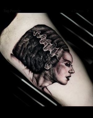 Get a stunning black & gray tattoo of a lady head by artist Miss Vampira, perfect for your arm