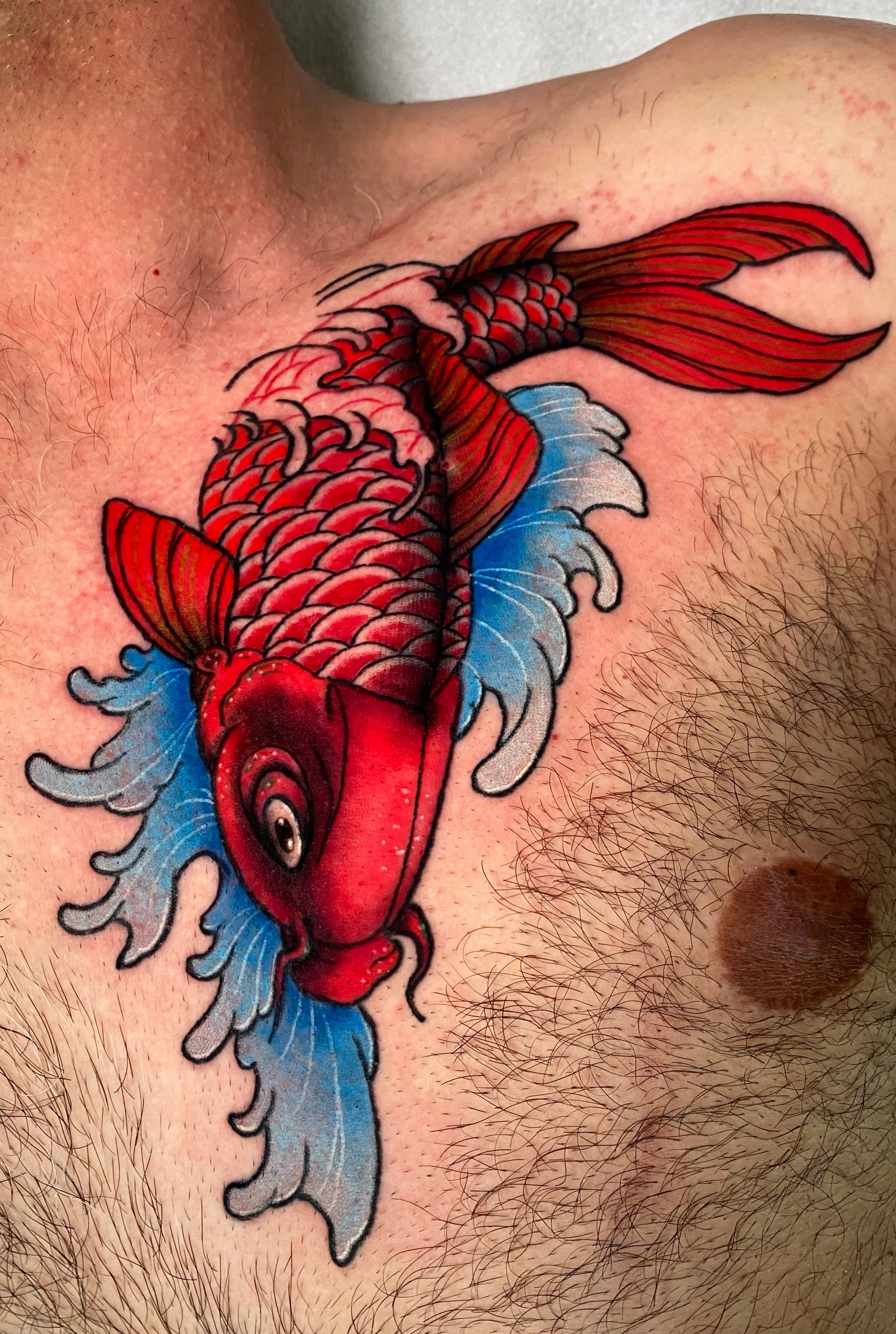 Couldn't hold it anymore, been wanting a koi tattoo for over a year, well  it's not on my back but yeah, calf will do. Colors will be added as well,  to spot