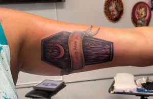 Purple coffin wedding tattoo. Who says you can’t be sappy and spooky? 