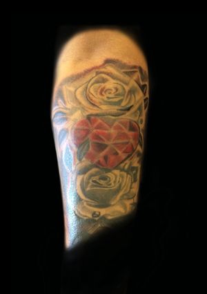 Forearm tattoo with a bit of colour 
