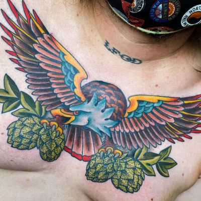 Epic chest eagle with glittery hops. This is a beer tattoo. 