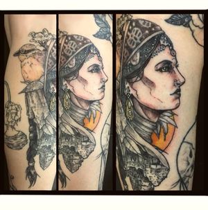 Beautiful neo-traditional tattoo on arm featuring a bird and woman, created by Frankie Brown.