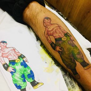 Vibrant new school tattoo of Majin Boo by artist Frankie Brown, bringing your favorite character from Dragon Ball Z to life on your lower leg.