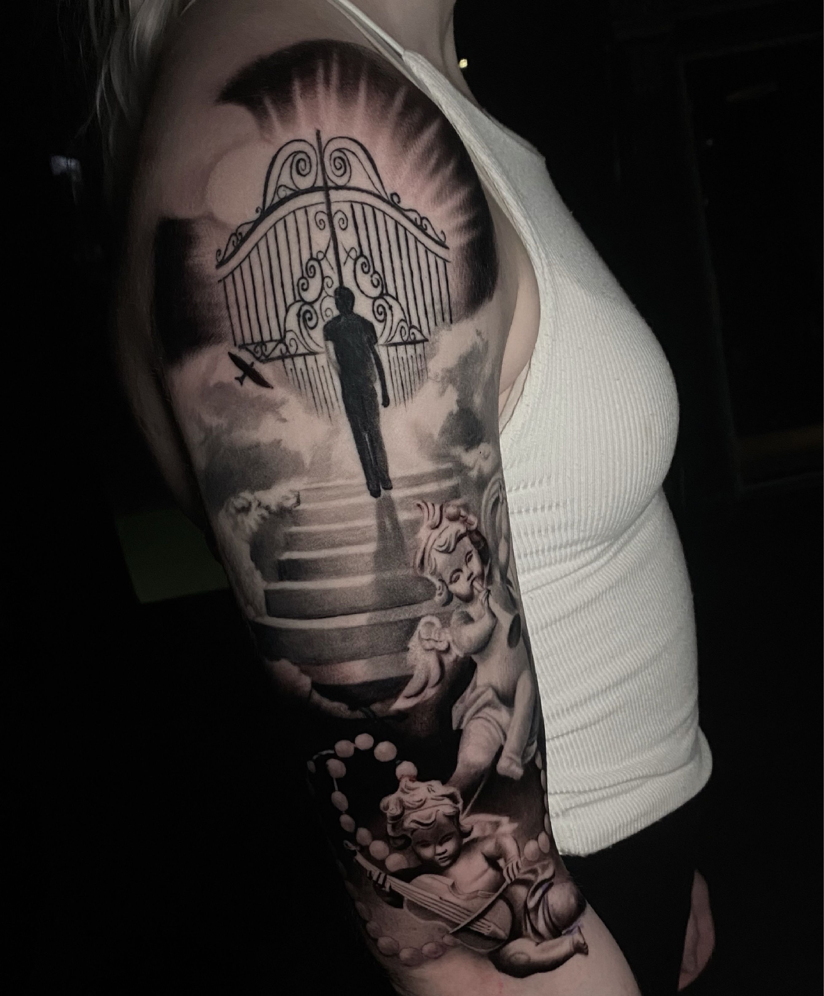 gates of heaven arm tattoos