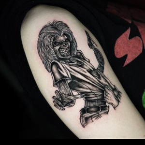 Let Miss Vampira bring Eddie the monster to life with bold blackwork on your upper arm. A unique and illustrative piece for the bold and fearless.