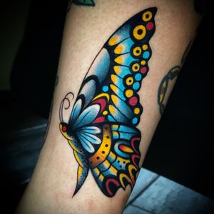Beautiful butterfly tattoo design by artist Darren Brass, perfect for forearm placement.