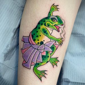 Experience the intricate beauty of Darren Brass's illustrative style with a unique design featuring a frog, toad, and cigarette on your lower leg.