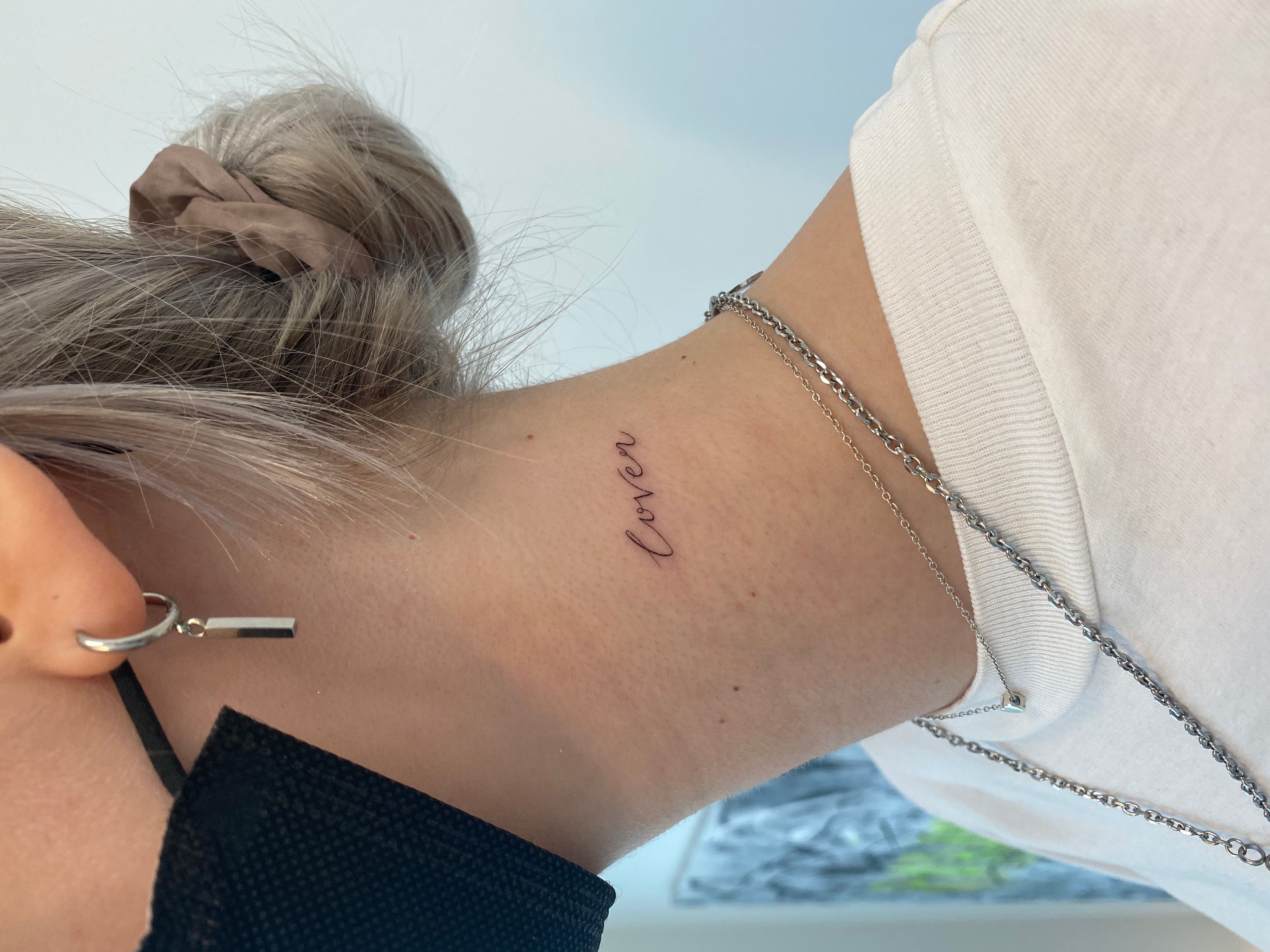Tattoo tagged with: small, wittybutton, languages, tiny, back of neck,  ifttt, little, english, wanderlust, lettering, english word, word |  inked-app.com