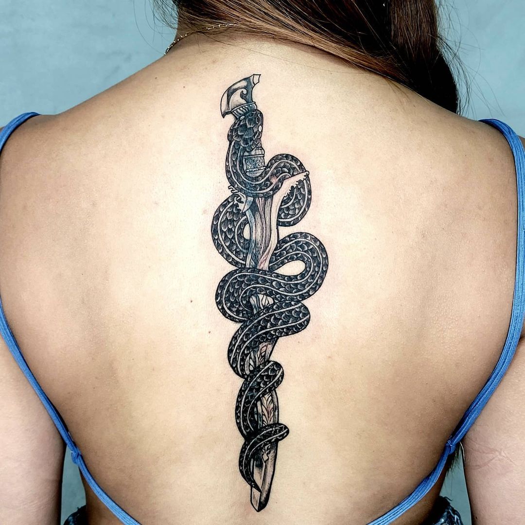 Snake back tattoo  Elegant tattoos Small tattoos Classy tattoos