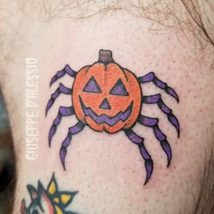 Tiny pumpkin spider. It's always a good time for a Halloween tattoo.