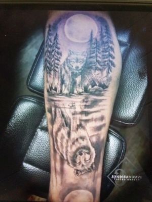 Black & White Wolf Pup Adult Wolf Reflection In Lake Arm Tattoo #BlackandWhite #Wolf #Arm