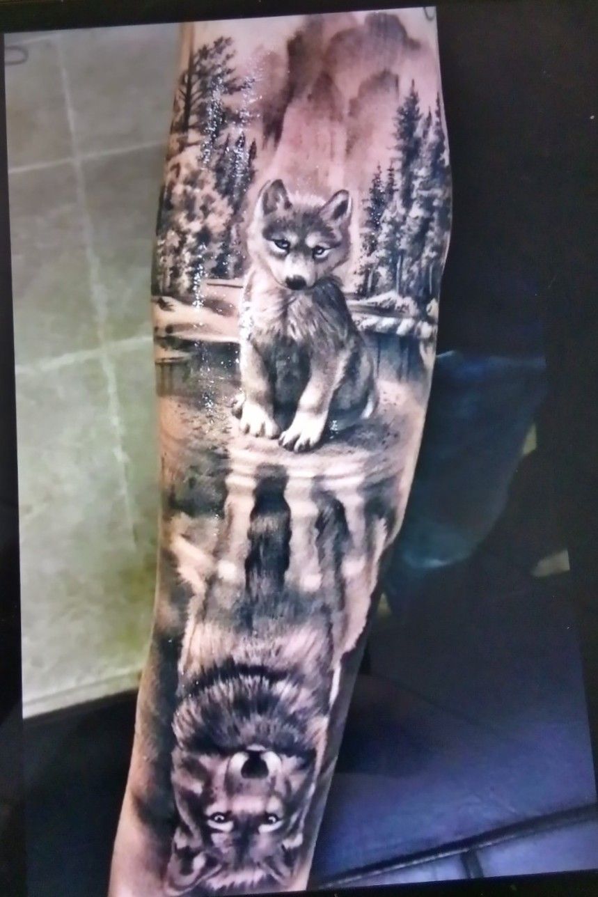 Tattoo uploaded by Ciera • Black & White Wolf Pup Adult Wolf Reflection In  Lake Sleeve #BlackandWhite #Wolf #Arm • Tattoodo