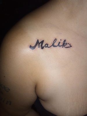 Fresh (bit swollen) styled lettering of client's man's name- 'Malik' 