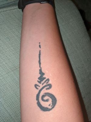 Fourth tattoo, right inner forearm unalome