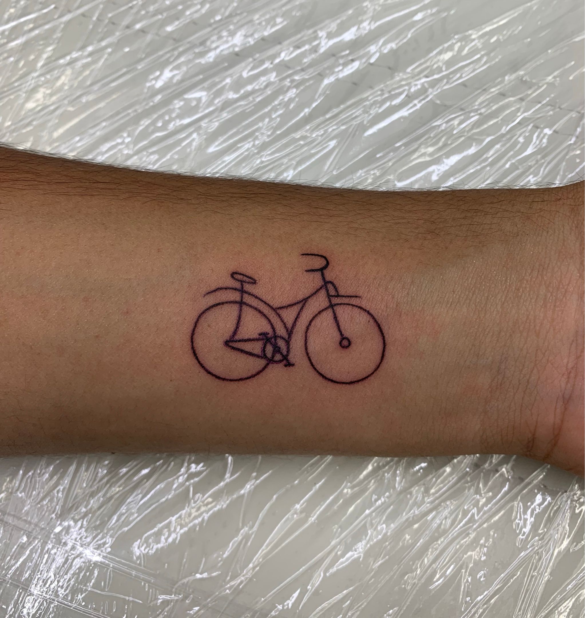 Bike tattoo.