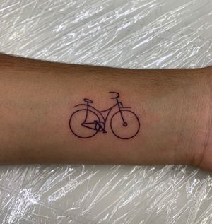 Small bike tattoo #linework #tattoo #biketattoo #wristtattoo #smalltattoo