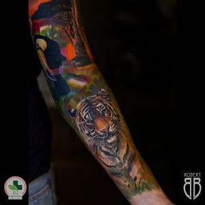 Full sleeve animals color tattoo combined with black and gray. Sponsored by Kenoil CBD aftercare