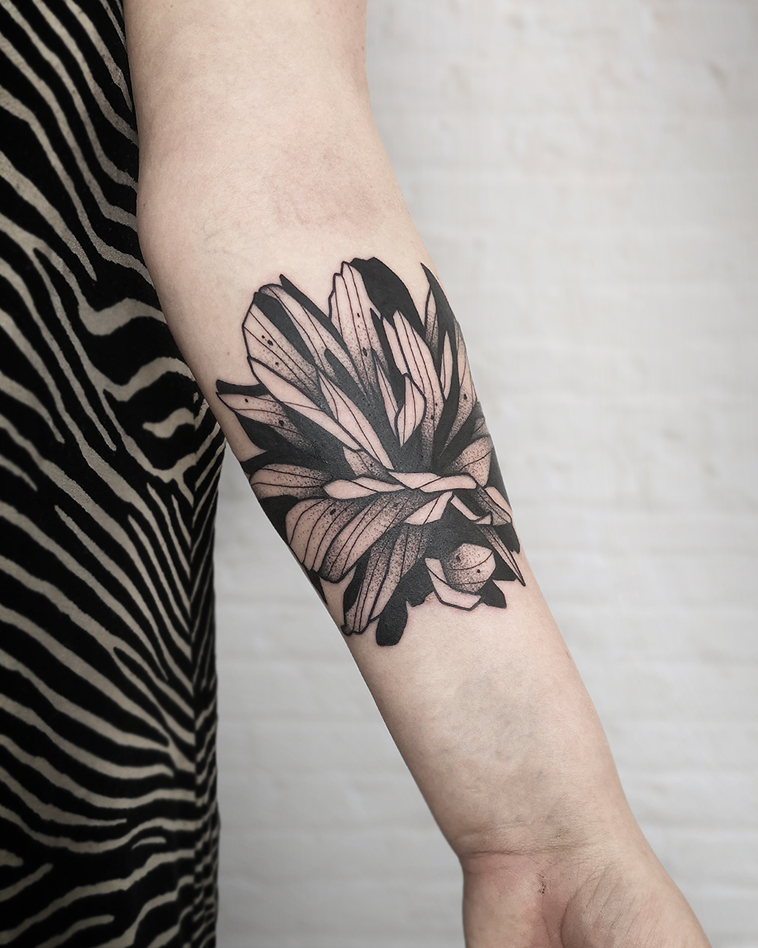 Abstract flower piece on the arm  Tattoogridnet