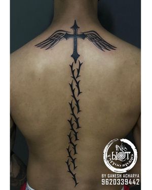 Cross with wings full spine tattoo done @inkblottattoozContact :9620339442#tattoo #tattoos #backtattoo #tattooideas #tattoodesigns #tattoodesign #tattoogirl #tattooart #tattooartist #tattooflash #crosstattoo #tattooink #tattooshop #tattooideas #inked #inkedgirls #inkedlife #inkedmen — Inkblot tattoo & art studio