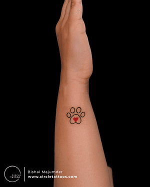 Paw tattoo by Bishal Majumder at Circle Tattoo #tattoo #tattooidea #pawtattoos #pawtattooidea #smalltattoo #minimaltattoo #minimaltattooideas #tattooartist #circletattoo #circletattooindia