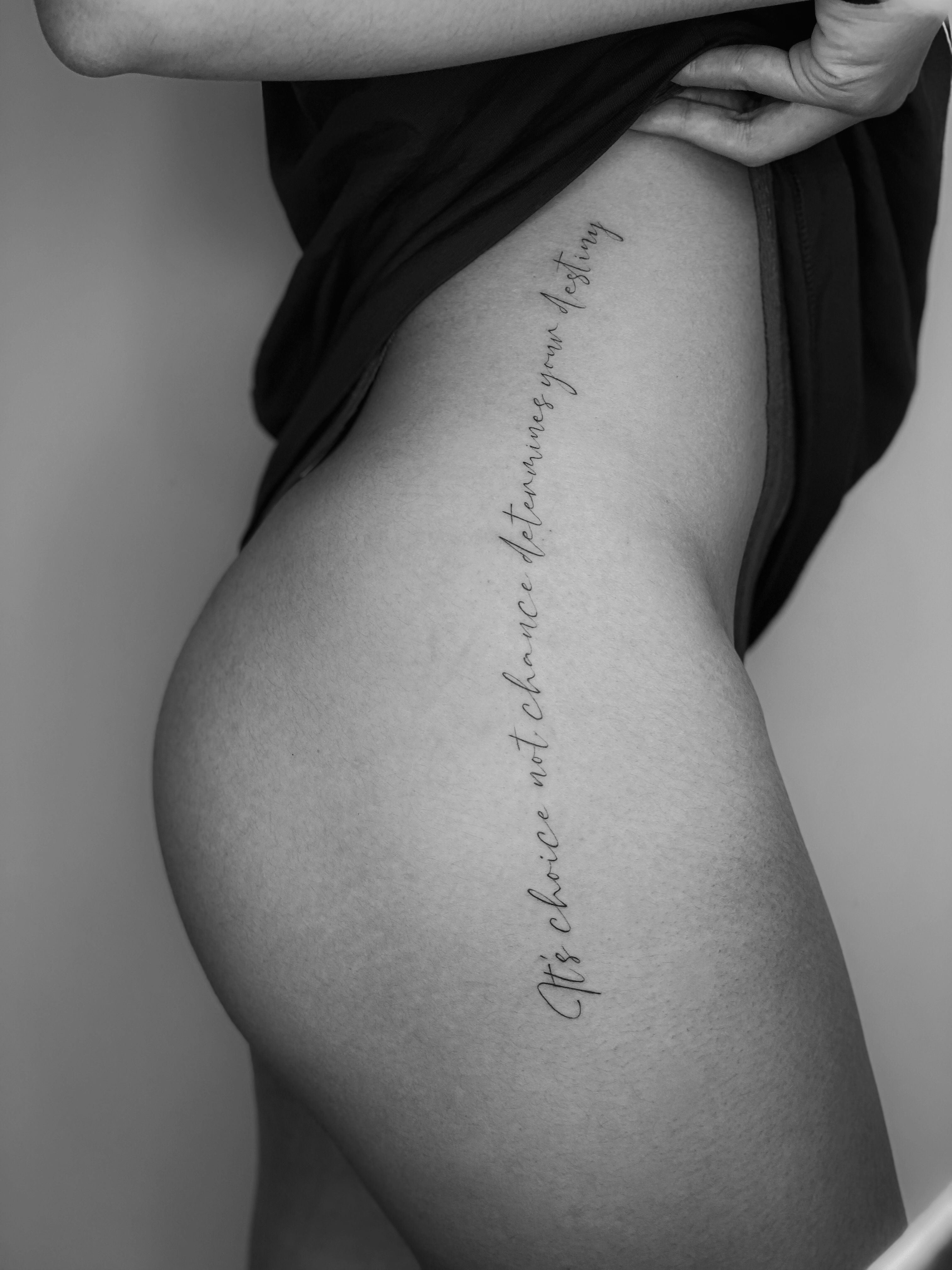 Thigh Tattoo with Romantic Quote