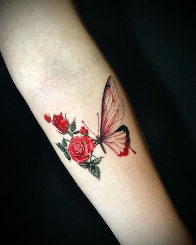 Butterfly + roses #colortattoos #realism #flowertattoo #butterflytattoo #colorrealism #armtattoo 