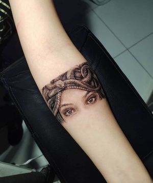 Get a stunning blackwork medusa tattoo on your forearm in Los Angeles. This illustrative design will make a bold statement.
