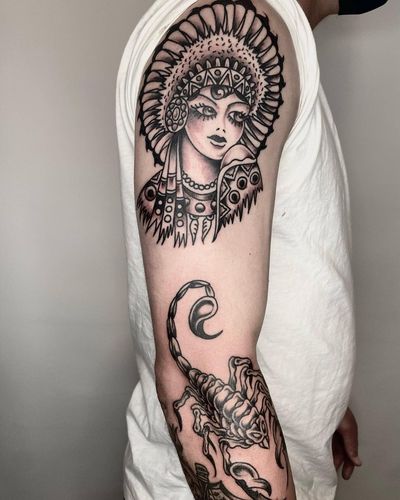 Girl and Scorpion #traditionaltattoos #blackandgrey #scoripiontattoo #armtattoo #traditionalblackandgrey